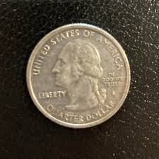 Found in change from grocery store. 2004 S Michigan Quarter. Is it silver? : r/coins
