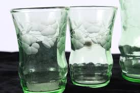 Sold at Auction: Uranium Glass Etched Glasses Lot Of Five