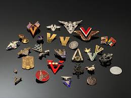 Sold at Auction: Lot of WWI WWII Victory Pins & Medals