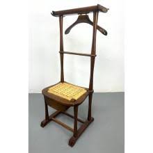 Sold at Auction: ITALIAN SPQR WOOD VALET STAND CHAIR. WOVEN RUSH SEAT WITH LOWER DRAWER. MARKED.