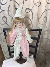 World Bazaars Inc Porcelain Doll With Wooden Stand In ...