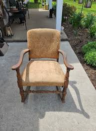 My parents have this chair that belonged to my father's great grandmother. They are looking for someone who can reupholster and recondition the wood. Anyone here know someone who does that kind