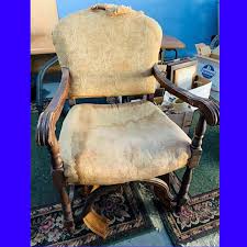 A family heirloom chair from LA County restored to its former beauty. Chair was stripped of old fabric, sanded to raw wood, colored to customer's choice of color, and refinished to a