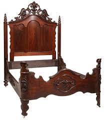 Lot - American Victorian Carved Walnut Bedstead