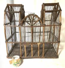 Sold at Auction: Antique Wire & Wood Birdcage w Asian Vessel