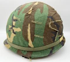 Sold at Auction: Grenada Camo Army Helmet