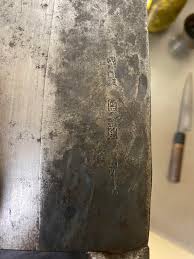 My dad just bought me this at a flea market. Any help identifying it? I tried searching what was in English but I didn't get anything : r/chefknives