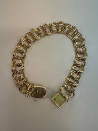 14 Karat Wide Triple Link Charm Bracelet For Sale at 1stDibs | pat 3308517, pat 3308517 14k bracelet, day tripper charm bracelet