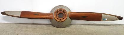 Sold at Auction: Wooden airplane propeller