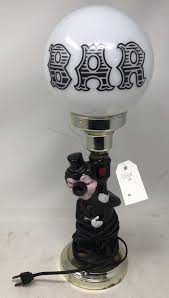 Lot - A fun bar light featuring a staggering man leaning ...