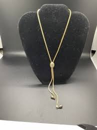 Necklace Gold Tone Oval Weight Charms On Ends Of Uneven ...