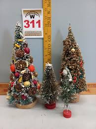 Sold at Auction: 4 Mini Christmas trees