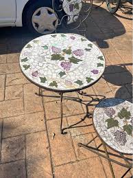 Outdoor antique setting 3 piece marble top has rust but still very sturdy