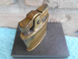 VINTAGE TIKI WIFEU OVAL AUTOMATIC BRASS CIGARETTE LIGHTER ...