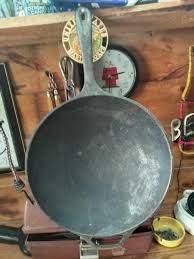 What is the worth and age of this cast iron wok?
