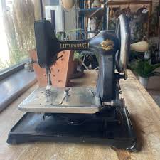 Antique hand-cranked sewing machine, black, Little Worker ...