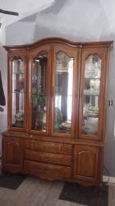 China Cabinet, it's 2piece with glass inside of it. It's ...