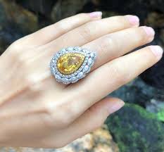Yellow Sapphire with Diamond and Yellow Diamond Ring Set in 18 Karat White Gold For Sale at 1stDibs | how much is a 3.72-carat yellow diamond worth, yellow diamond worth