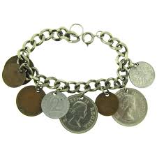 Vintage silver tone coin charm Bracelet. For Sale at Ruby Lane