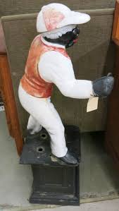 Lot - FIGURAL CAST IRON 'LAWN JOCKEY' HITCHING POST, a "