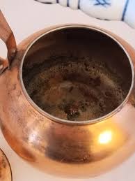 A timeless vintage piece: copper teapot with a charming ...