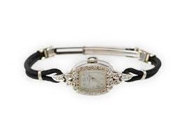 Sold at Auction: 14K WHITE GOLD LADY HAMILTON CORD WATCH