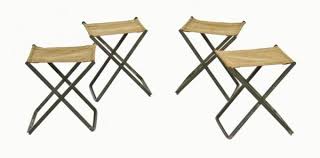 set of four matching vintage world war ii american army portable field chairs with original stitched canvas seats