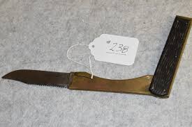 Sold at Auction: Ka-Bar folding fish knife with black bone ...