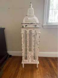 60” flower decorated pool noodle. - all florals are fake and superglued into noodle. Pretty sturdy and lasted through 3 major events. - Used on a 5ft backdrop at a wedding -