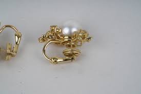 Lot - PAIR OF 18 KARAT YELLOW GOLD, DIAMOND, & CULTURED ...