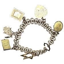 Vintage Judaica Themed 14k Gold Charm Bracelet: 7 Interesting Charms. For Sale at Ruby Lane