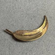 Feather Brooch with Silvertone Heart Center | Mercari