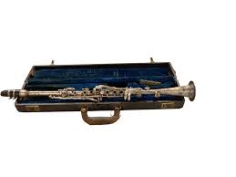 Sold at Auction: Metal Champion Clarinet in Case, Made in the U.S.A.