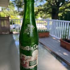 Vintage Mountain Dew soda bottle from 1965. It... | Depop