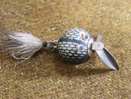 Sold at Auction: THREE FISHING LURES ONE CREEK CHUB ONE HEDDON AND ONE WOODEN ONE