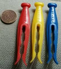 Vintage 4 Plastic CLOTHESPINS, red, blue, yellow, and white ...