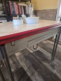 Red stools for a circa 1950 table
