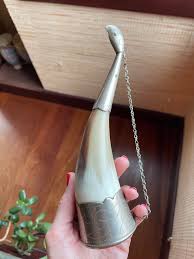 Found this at my friend's house. Seems to be 6in long, likely an animal horn - but I feel like maybe it has a purpose that we don't know? There are no words on it anywhere. : r/Whatisthis