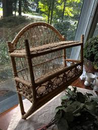 Vintage Rattan Shelf 18.5” tall x 15.5” wide In excellent shape. Has 2 hooks, ready to hang! 🏷️$34 Comment CLAIM to shop this item. Shipping calculated after item is claimed. Multiple purchases