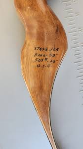 What is the age and maker of this vintage arrowhead?