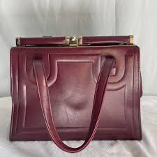 Burgundy vintage leather clutch bag with gold... | Depop