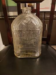 Vintage Glass Water Bottle with Sailboat Embossed on Front ...