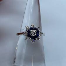 Blue Sapphire and Diamond Flower Ring – Legacy & Co. Jewelers