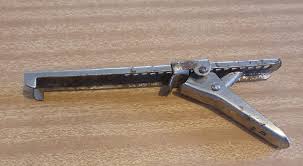 My friend has this gadget from her great grandmother. It has a sewing connection but she has no idea what it was used for. Any suggestions? (pics in cmt)