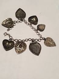 VINTAGE STERLING SILVER 7" BRACELET WITH 8 LARGE HEART CHARMS . | eBay