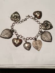 VINTAGE STERLING SILVER 7" BRACELET WITH 8 LARGE HEART CHARMS . | eBay Australia