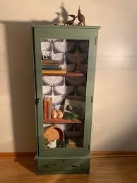 Deep forest green accents, vintage-inspired wallpaper, and ...