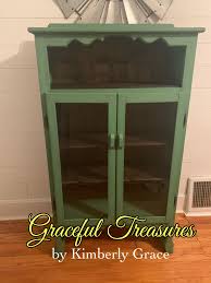 Upcycled cabinet with reclaimed wood shelves