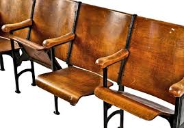 original and intact c. 1920's freestanding robust cast iron and varnished birch wood "theater" style drop-