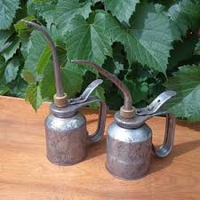 Dos latas de aceite Vintage Eagle - Etsy México